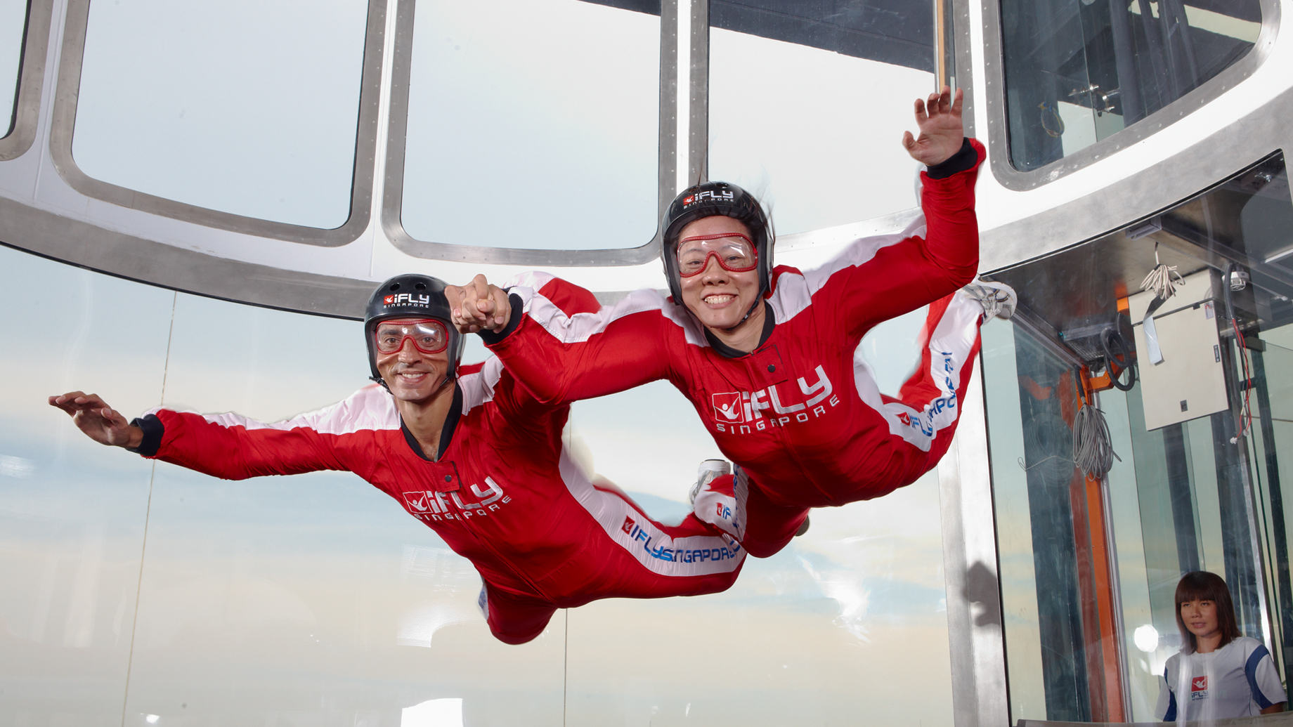 A couple experiencing true free-fall conditions in iFly Singapore